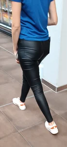 German Girl with shiny leather Jeans Ass in supermarket