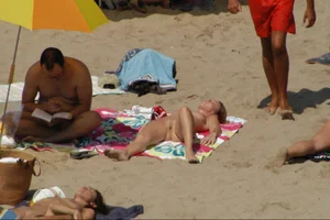 Girls on a nude beach in Sitges, Spain