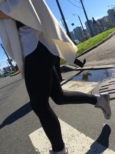 Blonde Girl With Fit Muscular Legs in Tight Black Jeans and Sneakers on a Crosswalk  - Street Creepshots Collection