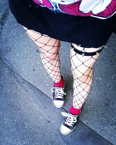 Street Candid of Cute Skinny Teen in Fishnet Pantyhose and Mini Skirt