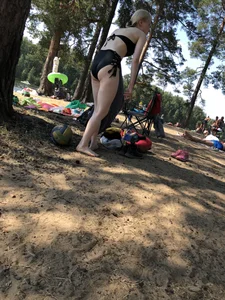 Group of Girls in Swimsuits at a Lake Beach