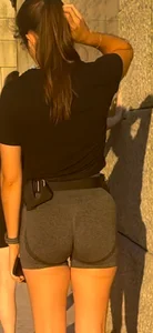 Girl exercises her cute butt in public at sunset
