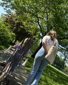 Hot milf's ass in tight blue jeans, creepshot at the park