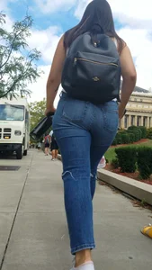 Two girls with nice asses walking in tight jeans