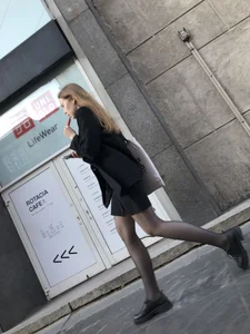 Great legs in black pantyhose, candid girl walking down the street