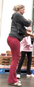 Pawg in red yoga pants bends over, upshots, long follow