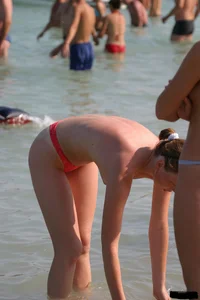 Sexy candid topless and nude beach girls