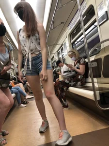 Cute And Slightly Awkward Tall Teen Girl in a Top and Denim Shorts Subway Train Candid Photos