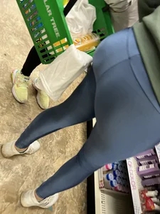 Ass in blue leggings