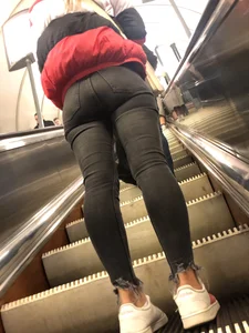 Candid Butt in Tight Black Jeans on a Subway Escalator  Photos