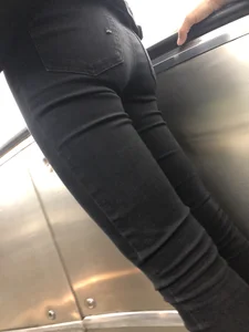 Skinny Girl in Black Tight Jeans on Subway Escalator Candid Closeup