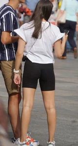 Cute brunette with a nice ass in spandex shorts