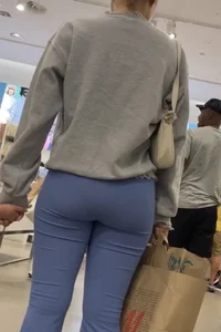 Hot blonde in leggings power blue