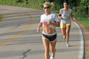 Candid track girls and runners