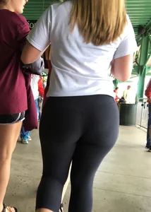 Big booty babe at a baseball game in tight leggings