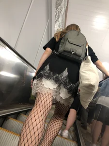Cute Girl in Lacey Semi-Transparent Dress and Fishnet Pantyhose Subway Escalator Candid Photos Gallery