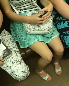Girl in a Dress and Sandals in the Subway Train Creepshot