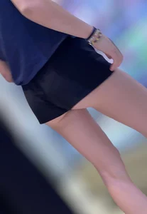Sexy fit ass in mini shorts and slim legs closeups