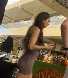 Brunette with tight and perky ass in brown one-piece (OC)