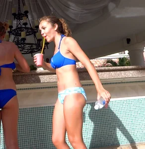 Stills of a beautiful blue eyed bikini babe in blue top