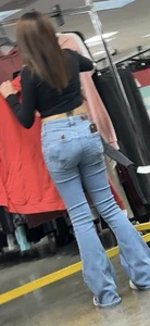 Petite Asian ho showing off tramp stamp & bubble butt