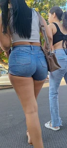 super sexy denim short shorts on this brunette with tremendous legs and big butt