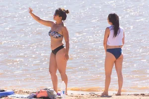 Candid beach girls in thongs