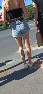 Hot Candid Girl in a Top and Denim Shorts on a Crosswalk Creepshots - Amazing Skinny Legs