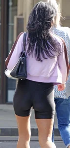 [It’s an older Milf, but it checks out] tight toned body showing off her ass, thigh gap & cameltoe in shiny shorts