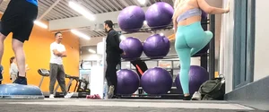 Gym blonde in turquoise leggings notices me and doesn’t mind, even moves in front of me later for some close-ups