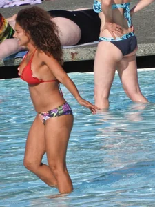 Hot ass milf with an amazing body at the pool