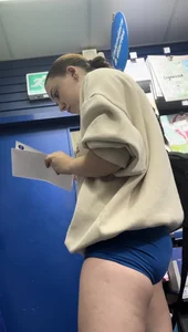 Stunning cheeked up gym girl shopping in blue shorts (OC)