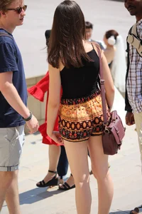 Beautiful brunette in loose patterned shorts