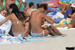 Beach voyeur babes in bikinis, thongs and topless