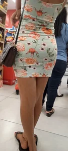 Hot skinny girl in flowered skirt
