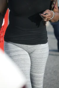 Ebony milf out shopping in grey leggings