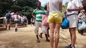 Milf in yellow shorts with vpl and a wedgie