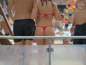 Hot girl with wide hips and nice gap in a red Spider Man thong bikini