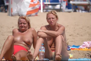 Girls on a nude beach in Bibione, Italy