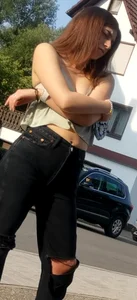 Hot teen wearing black ripped jeans street creepshot