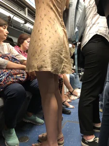 Cute Girl in a Dress with Skinny Legs in Sandals Subway Train Candid Photo