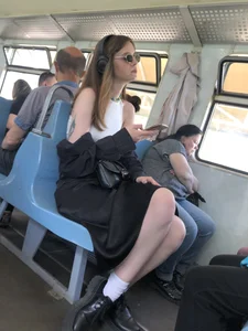 Hot Girl in a Dress With Great Legs Sitting in a Public Train Creepshots