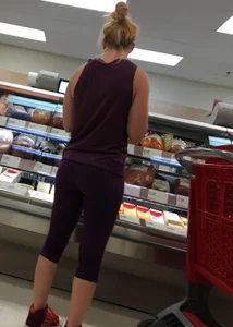 Blonde bubble butt babe shopping in tight purple leggings
