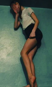 Skinny Teen in Short Skirt and Bare Feet