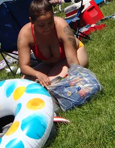 Thick girl with tattoos, big tits and a big booty in a little bikini