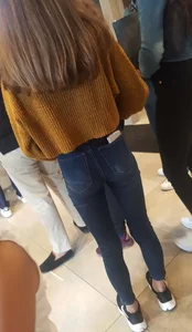 Perfect ass in tight blue jeans with a phone in back pocket at the store creepshots