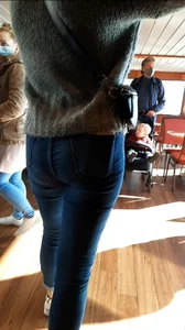 Brunette in tight blue jeans