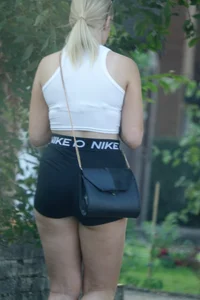 Pair of oblivious teens in short shorts