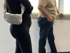 Cute little Latina ass in bank line. OC
