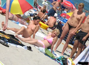 Beach voyeur babes in bikinis, thongs and topless